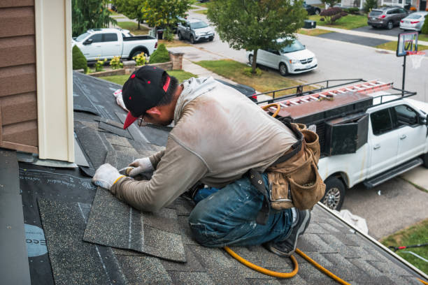 Professional Gutter Repair And Installation technician working in Mills River, NC
